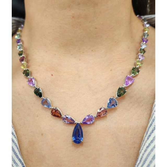This exquisite necklace is a stunning display of modern elegance, meticulously crafted in platinum. Featuring 51 natural...