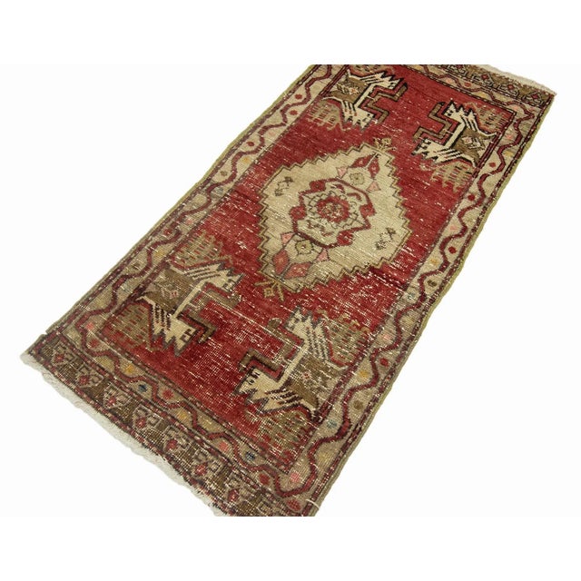 Vintage Handknotted decorative mini rug from Kars region of Turkey. Approximately 45-55 years old. In very good condition.