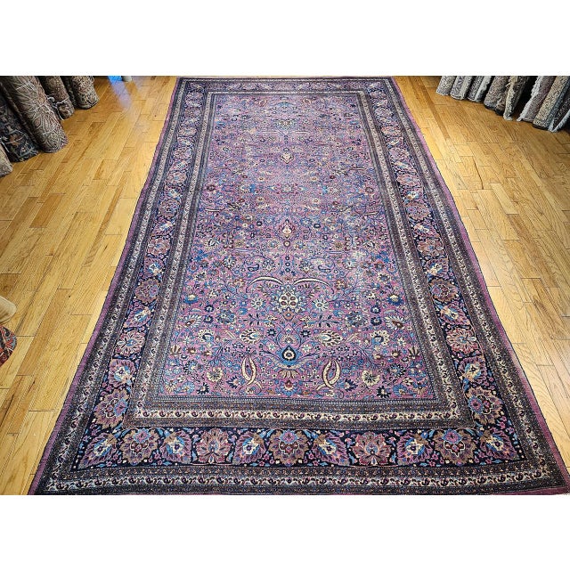 This extraordinary vintage Persian Khorassan rug is a striking example of refined elegance and artistic mastery,...