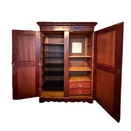 Beautiful English 1840's Biedemeier wood armoire with crotch mahogany panels. Easily assembled/disassembled. Made in...