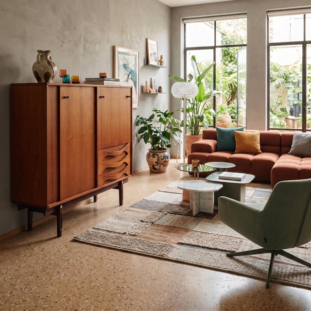 This tall sideboard is part of the tradition of Italian cabinetmakers in the Cantù area—a true flagship of quality...