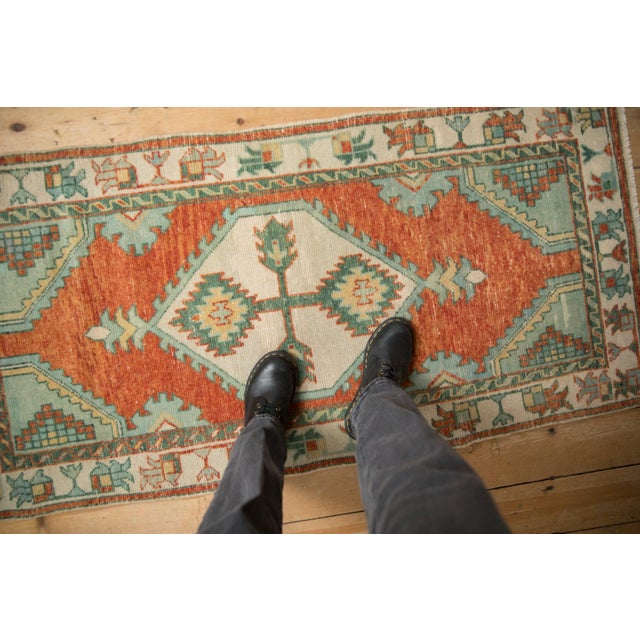 :: Hexagonal center medallion with simplistic serrated quatrefoil center floral bouquet adorned at either end by tiered...