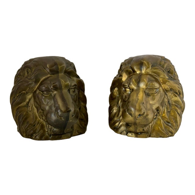 Pair of Vintage Hollywood Regency Brass Lion Head Bookends or Bookshelf Decor For Sale