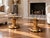 A handsome pair of Neoclassical-style pedestal plant stands or occasional tables, each featuring a square polished marble...
