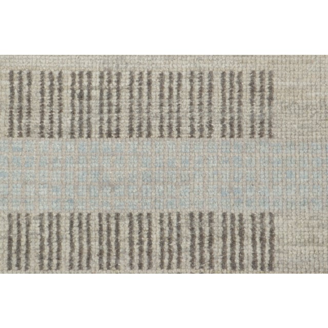 Hand-knotted in wool, this 2x3 contemporary geometric gift-sized rug joins Rug & Kilim’s Modern collection. The design...