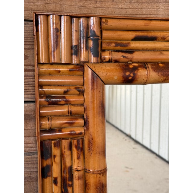A timeless vintage bamboo wall mirror with beautiful natural character and warmth. Crafted from cut bamboo and rattan, the...