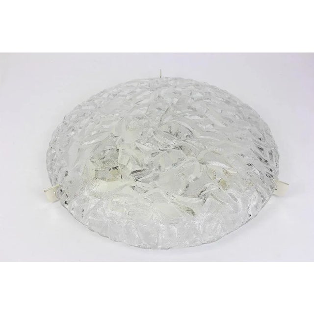A wonderful round murano glass flush mount made by kaiser leuchten in germany, 1970s. Thickly textured murano glass...