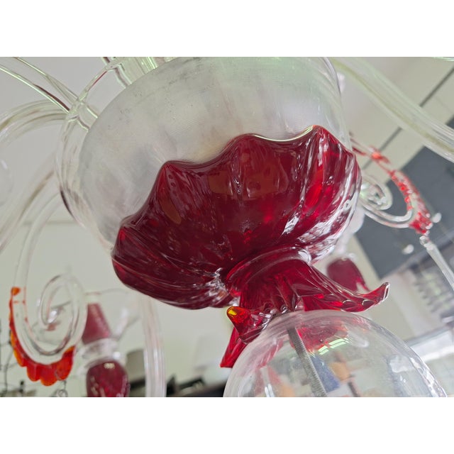 Chandelier in Transparent and Ruby ​​red Glass in Galliano and Murano Iron, in Flawless conditions. Designed from 2000 I...