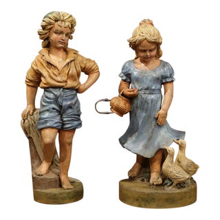 Pair of Mid-Century French Painted Iron Garden Statues of Children Sculptures For Sale