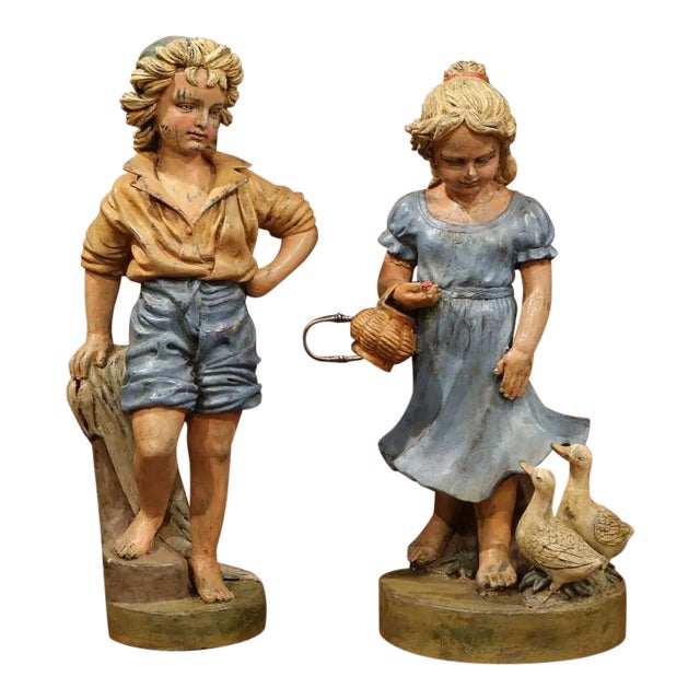 Pair of Mid-Century French Painted Iron Garden Statues of Children Sculptures For Sale