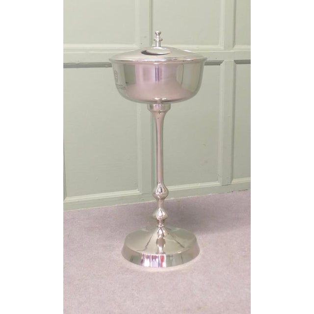Mid Century Floor Standing Chrome Champagne Ice Bucket This is a charming piece it stands on a central column and has...
