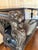 Beautiful and substantial 19th Century Victorian settee featuring hand-carved lion head arms, classical saber legs, and a...
