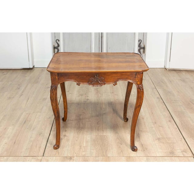 This elegant French cabaret table from the 20th century exemplifies timeless craftsmanship and charm. Constructed from...