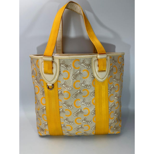 Contemporary Pre-Loved Celine Yellow Beige Canvas Coated PVC Plastic Macadam Tote Bag For Sale - Image 3 of 18