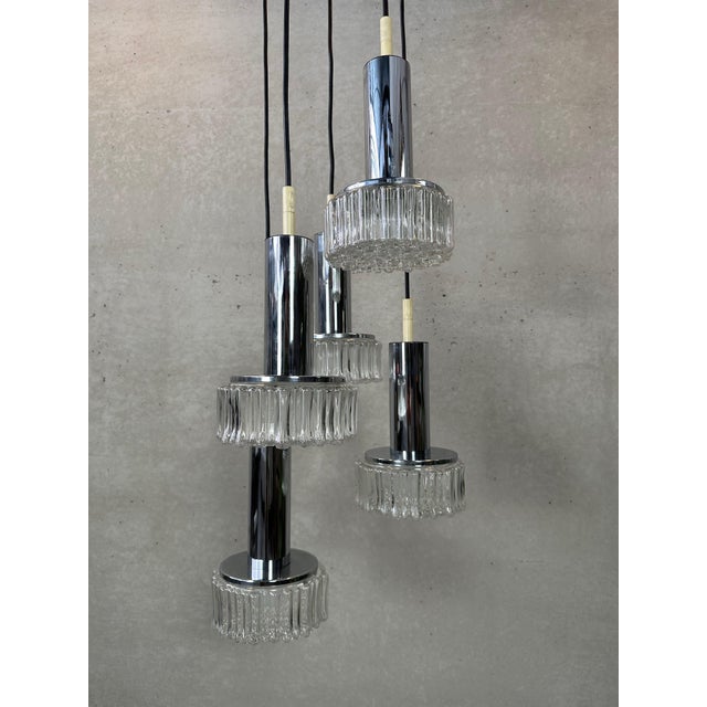 Beautiful cascade hanging lamp from staff leuchten. Model: p105. 5 fixtures in chrome and glass. Glass in excellent...