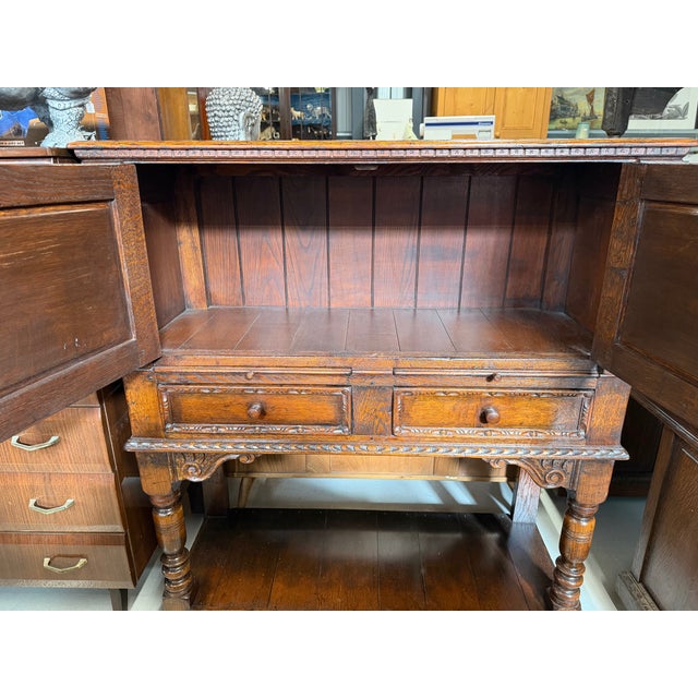 Carved Oak Drinks Cupboard, 1970s, in Very Good conditions. Designed 1970 to 1979