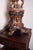 Hand-carved wooden lamp with rich polychromy. Atypical design, where a boy carries the light in the Baroque style....