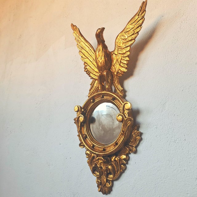Gilded Wooden Wall Mirror with Eagle Motif, in Very Good conditions. Designed before 1890