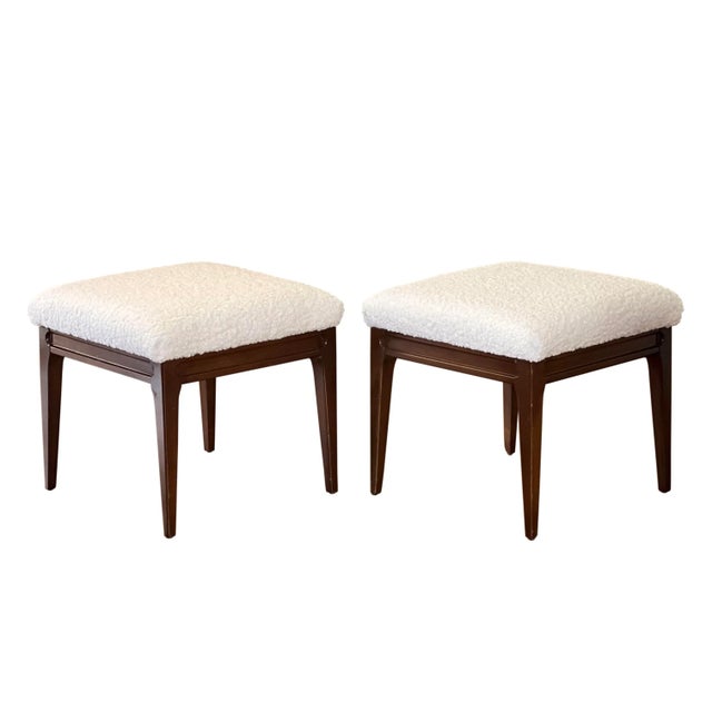 Elegant pair of midcentury walnut bouclé stools or benches, newly reupholstered. The versatile pair has any possibilities...