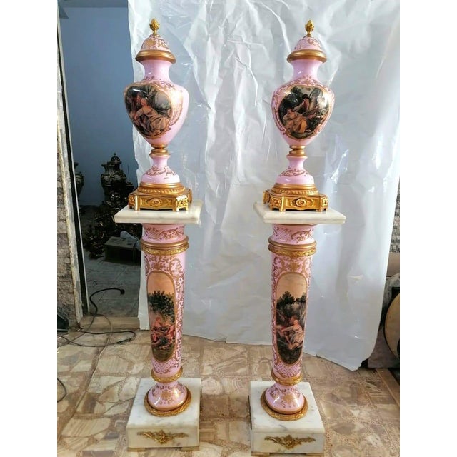 Add a romantic and refined touch to your interior with this grand decorative vase and matching pedestal, beautifully...