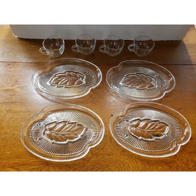This is a 1959 Federal Glass Crystal Leaf Snack Set, 8 Cups and Plates. The cups measure 2 1/4" high and 3 1/4“ in...