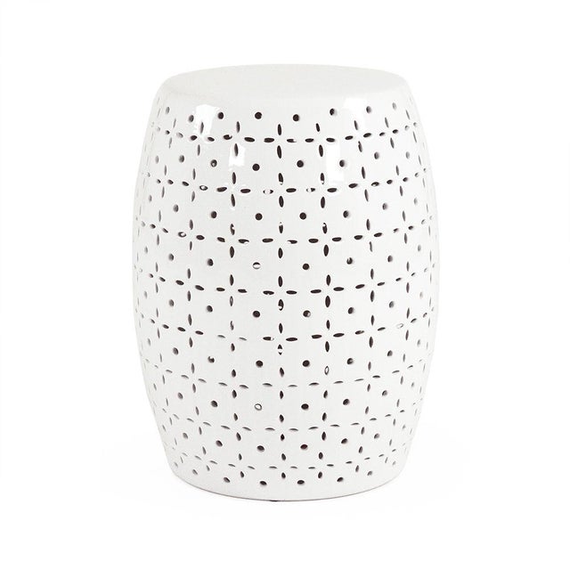 The Lovell Garden Stool is a ceramic garden stool with a barrel form and a delicate petal-flower pierced pattern in a...