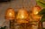 A monumental focal point of organic light and shadow. The Grand version of our Indonesian Bamboo Pendant serves as a...