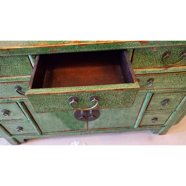 An exceptional, statement-making Chinese apothecary or altar-style sideboard originally curated by luxury retailer Neiman...