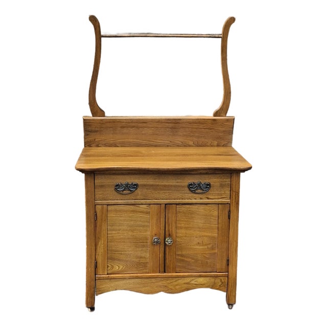 Mid 20th Century Victorian Style Oak Rolling Washstand Cabinet With Towel Rack For Sale