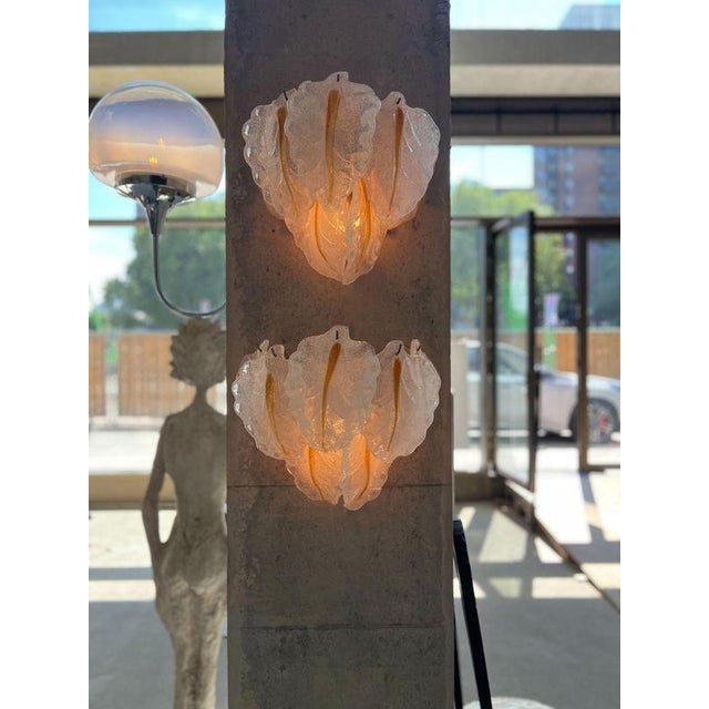 Designer mazzega italy 1960s h 35cm w 42cm d 25cm glass in bloom. A striking pair of vintage murano glass wall sconces,...