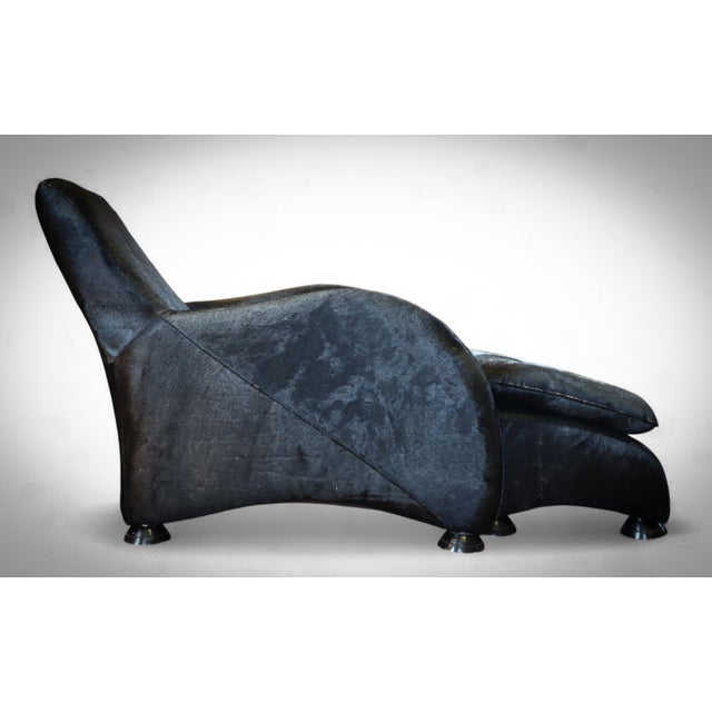 Up for grabs here is an absolutely stunning armchair with matching ottoman by stone international. model: sole excellent...