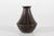 Decorative Art Deco vase made of disco metal with brown patina. It's designed and made by the Danish artist Just Andersen...