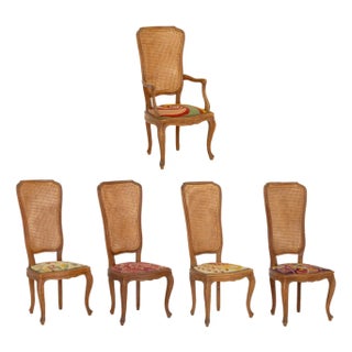 Set of Five Italian Provincial Style Cane-Paneled Walnut Dining Chairs For Sale