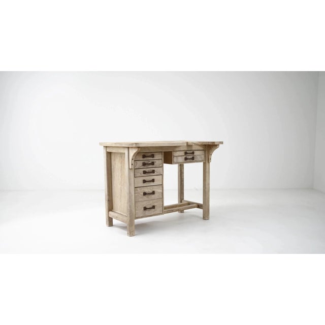 Crafted from durable beech wood, delicately bleached to a soft blond tone, this desk originates from 20th-century France....