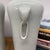 Tall White Ceramic Vases with Elephant Head Handles - A Pair For Sale - Image 12 of 13
