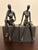 These 1970's iron bookends statuesque style are impressive in that they show depth details of each character specifically...