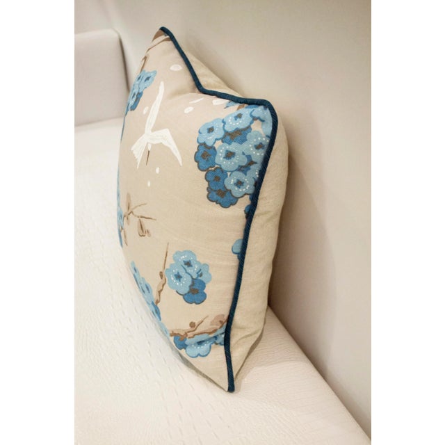 Osborne and Little 16" x 16" pillow with a cherry blossom print on the front, Solid linen neutral back, contrast welting...