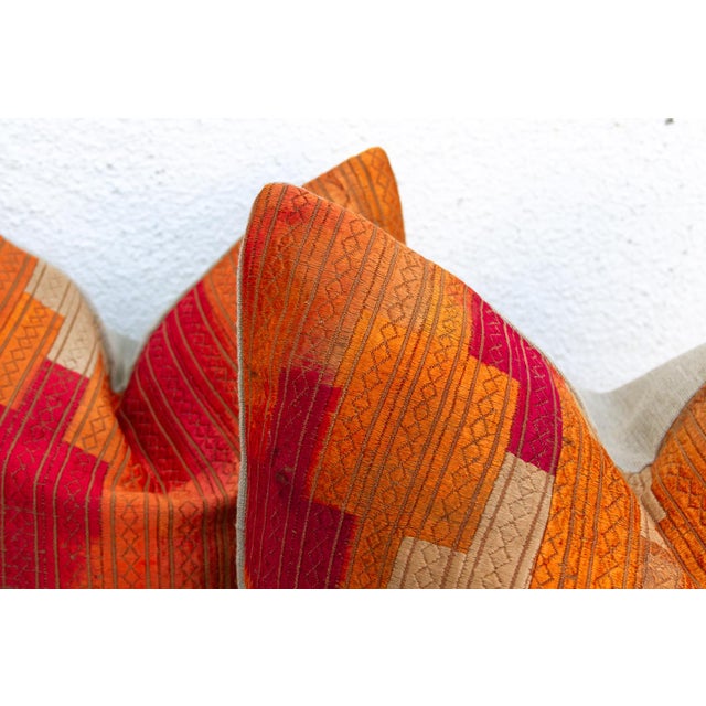 This curated set of two 18-inch square pillows represents a rare pinnacle of Museum-Grade Phulkari, repurposed from a...