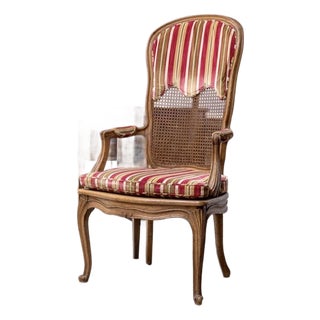 Antique French Louis XV Style Cane Back Armchair With Scalloped Upholstery For Sale