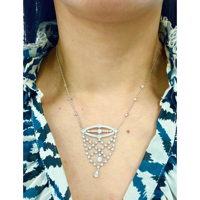 This stunning diamond necklace features 89 diamonds weighing 2.23 ct set in 18k white gold. The diamonds are G in color...