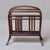 A charming bentwood magazine rack by Thonet, Vienna, circa 1900–1910. Steam-bent beechwood in original dark walnut stain...