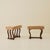 Pair of Italian Art Deco Stools, circa 1940's, featuring sculptural curved solid-wood legs and a rectangular upholstered...