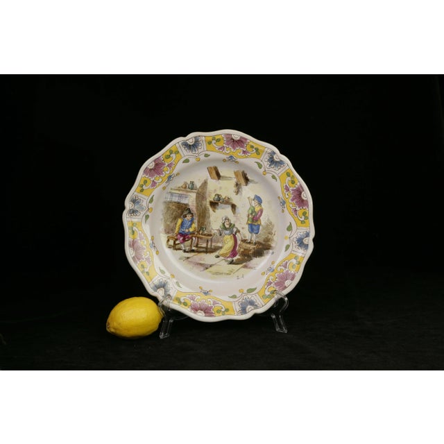 ONE OF FOUR SIMILAR PLATES AVAILABLE IN SHOP. From the potteries of Lille France in the late 19th century, a transfer with...