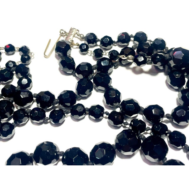 Art Deco, marked made in Austria, three strand, each strand slightly graduated from the last. Perfectly cut Czech glass,...