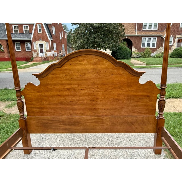 1990s king-size Thomasville poster bed with finely carved details and high quality construction. Strong and sturdy with...