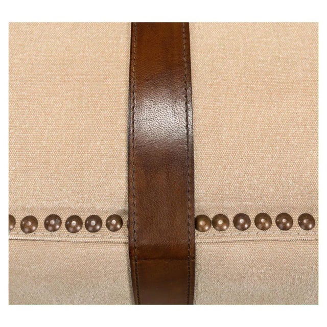 A canvas and leather strap ottoman with nailhead trim accents. The classic cube design makes it a perfect transitional...