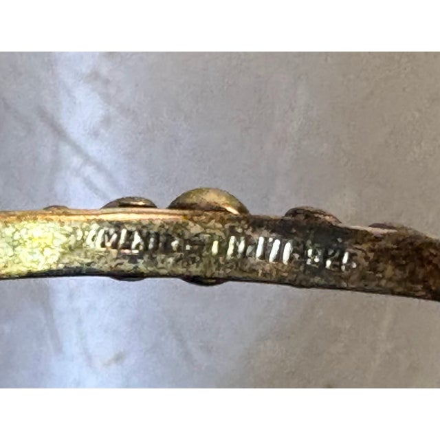 1960s-70s sterling silver/black onyx bangle bracelet. Marked at inside of band. Some mild patina to metal throughout as...