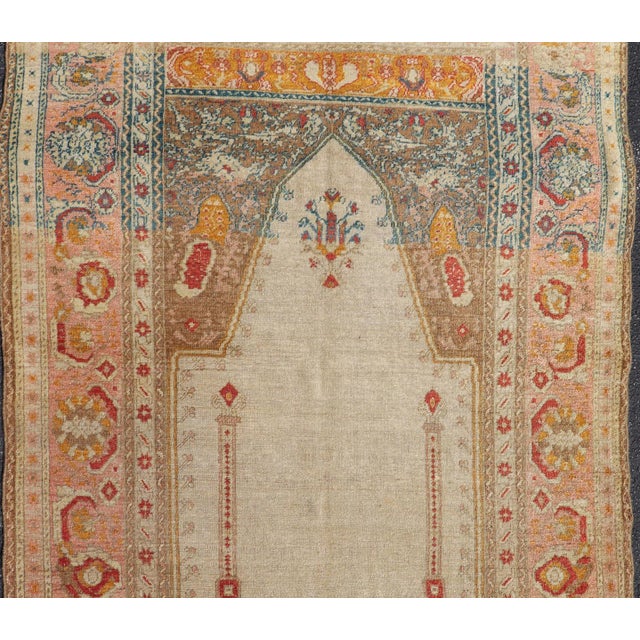 Antique Turkish Sivas prayer rug with floral design in ivory, taupe, and pink, Keivan Woven Arts / rug D-1007, country of...