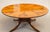 Wood English Regency Revival 72-Inch Figured Elm Sunburst Center Pedestal Dining Table on Brass Casters For Sale - Image 7 of 18