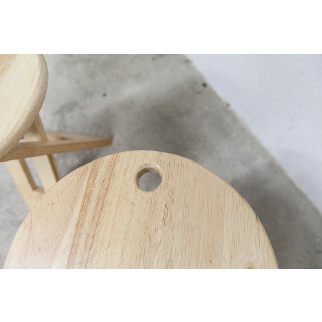 Pair of Adrian Reed folding stools from the 80s. They are in superb condition, a few fine scratches on the top of one.